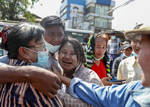 A released prisoner hugs family members outside the Insein prison in Yangon, Myanmar Friday, Feb. 12, 2021. Myanmar&#039;s coup leader used the country&#039;s Union Day holiday on Friday to call on pe ...