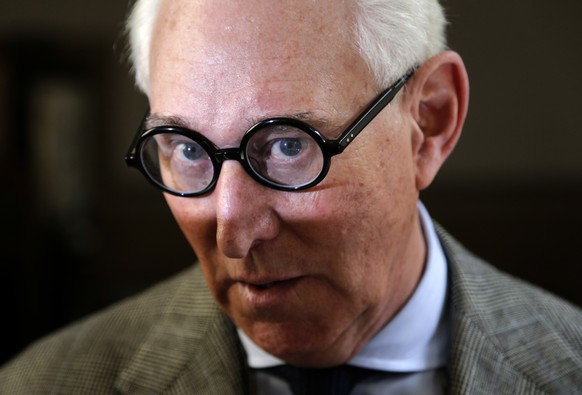 Roger Stone talks to reporters outside a courtroom in New York, Thursday, March 30, 2017. Stone, a longtime political provocateur and adviser to President Donald Trump, is being sued over a flyer sent ...