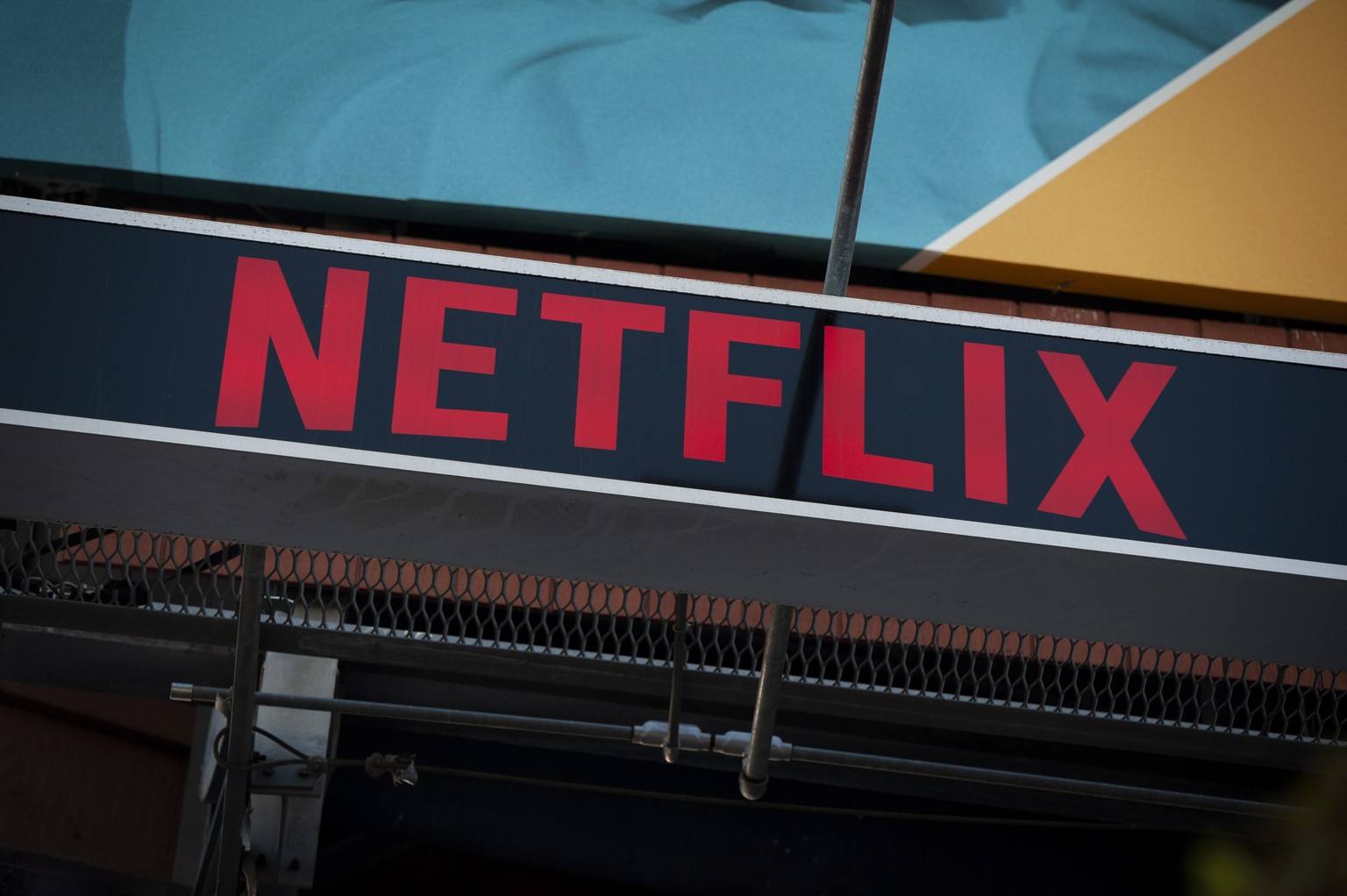 epa07932006 A Netflix billboard hangs above the Sunset Strip in Los Angeles, California, USA, 18 October 2019. On 17 October 2019 Netflix reported earnings of 1.47 US dollar per share, compared to ana ...