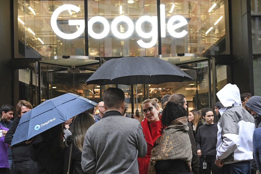 People outside the Google offices in Granary Sqaure, London, Thursday Nov. 1, 2018. Hundreds of Google engineers and other workers walked off the job Thursday morning to protest the internet company’s ...