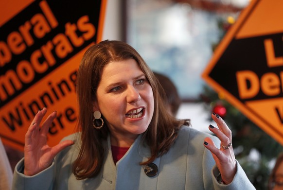 British opposition Liberal Democrats Party Leader Jo Swinson speaks as she joins activists for a final day election rally in Guildford, England, Wednesday, Dec. 11, 2019 during the General Election ca ...