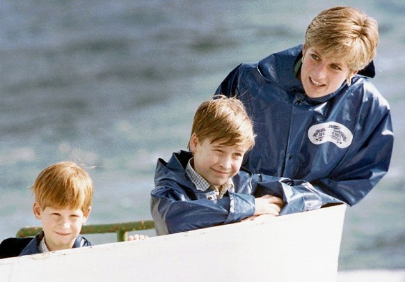Diana, Princess of Wales, enjoys a ride on the Maid of Mist in Niagara Falls, Ont., in this October 1991, photo, with her sons Prince Harry, then 7, and Prince William, then 9. (KEYSTONE/AP Photo/Hans ...