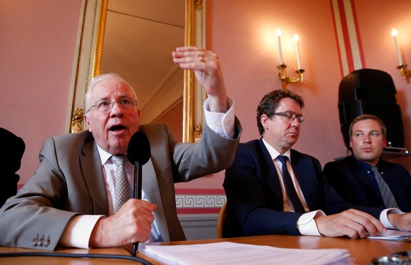 Christoph Blocher, president of the &quot;No to slow EU accession&quot; committee (L), gestures next to Albert Roesti (C) president of the Swiss People&#039;s Party (SVP) and Lukas Reimann, president  ...
