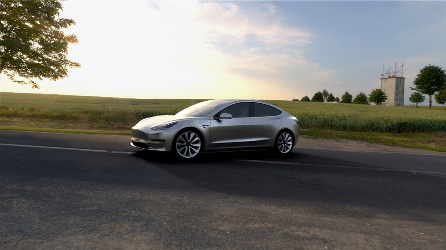 epa06063957 A undated handout photo made available by Tesla Motors on 03 July 2017 shows Tesla Model 3 in silver. The all-electric Model 3 was unveiled on 31 March 2016. According to a tweet by Elon M ...