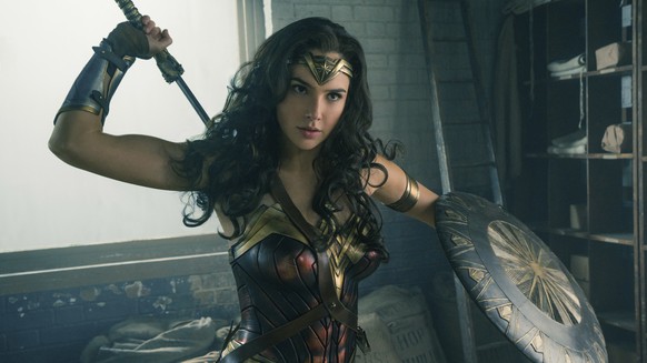 This image released by Warner Bros. Entertainment shows Gal Gadot in a scene from &quot;Wonder Woman.&quot; “Wonder Woman” wrapped up Tom Cruise’s “The Mummy” at the weekend box office, pulling in an  ...