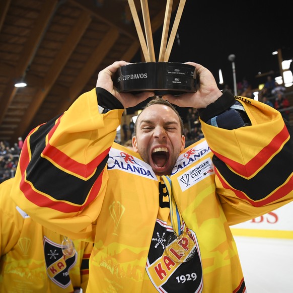 Kalevan Pallo&#039;s goalkeeper Daniel Manzato and Team celebrate after the final game between Team Canada and KalPa Kuopio Hockey Oy at the 92th Spengler Cup ice hockey tournament in Davos, Switzerla ...