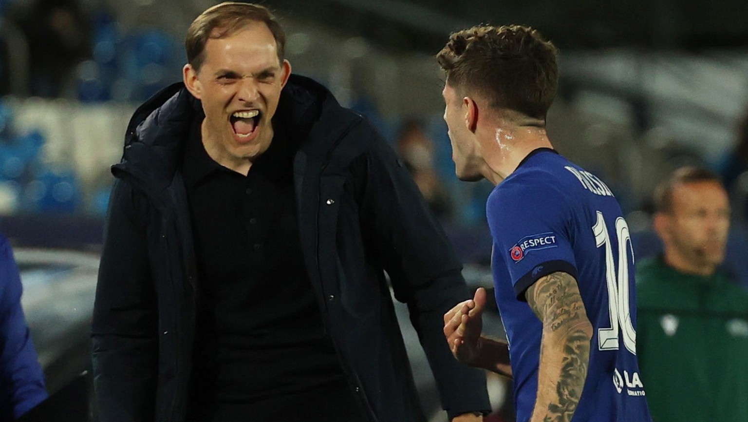 epa09164136 Chelsea&#039;s Christian Pulisic (R) celebrates with his head coach Tomas Tuchel after scoring the 0-1 lead during the UEFA Champions League semifinal first leg soccer match between Real M ...