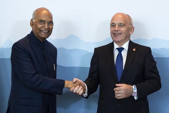 epa07839866 Swiss Federal President Ueli Maurer (R) and President of India Ram Nath Kovind (L) shake hands during a ceremony of signatures during a state visit to Switzerland in Bern, Switzerland, 13  ...