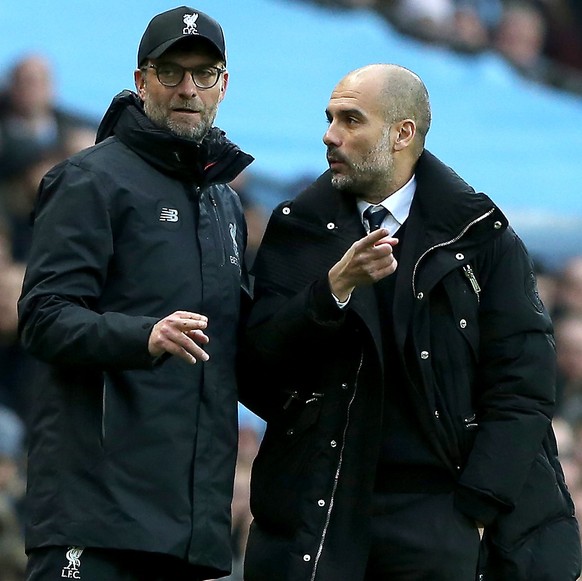 epaselect epa05858456 Manchester City&#039;s manager Pep Guardiola (R) and Liverpool&#039;s manager Juergen Klopp react during the English Premier League soccer match between Manchester City and Liver ...