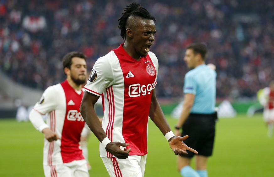 Ajax&#039;s Bertrand Traore (9) celebrates after scoring the fourth goal of his team during the first leg semi final soccer match between Ajax and Olympique Lyon in the Amsterdam ArenA stadium, Nether ...