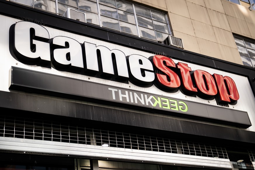 FILE - Pedestrians pass a GameStop store on 14th Street at Union Square, Thursday, Jan. 28, 2021, in the Manhattan borough of New York. Followers of YouTube personality Roaring Kitty, inspired by his  ...