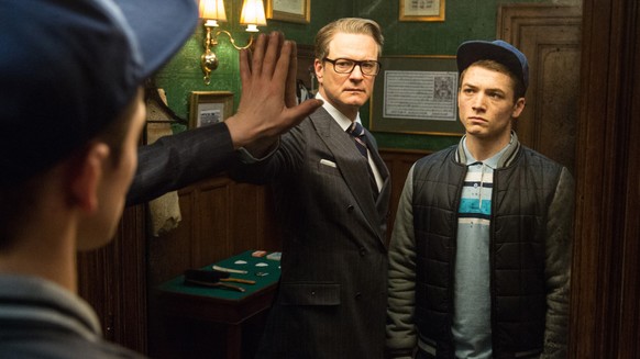 In this image released by 20th Century Fox, Colin Firth, left, and Taron Egerton appear in a scene from &quot;Kingsman: The Secret Service.&quot; (AP Photo/20th Century Fox, Jaap Buitendijk)