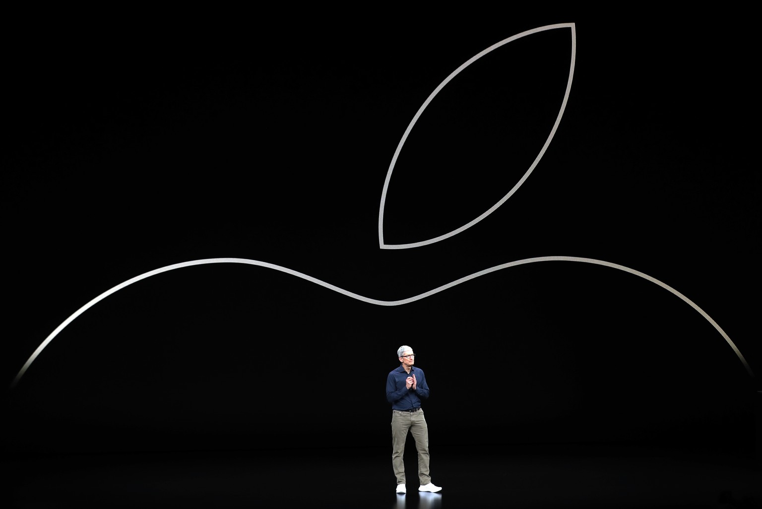 FILE- In this Sept. 12, 2018, file photo, Apple CEO Tim Cook discusses the new Apple iPhones and other products at the Steve Jobs Theater during an event to announce new products in Cupertino, Calif.  ...