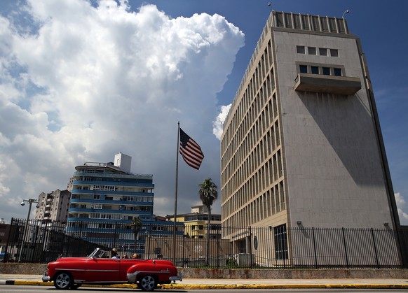 epa06134953 (FILE) - A classic car passes in front of the US embassy in Havana, Cuba, 16 June 2017 (reissued 10 August 2017). Media outlets report that the US State Department has expelled two diploma ...