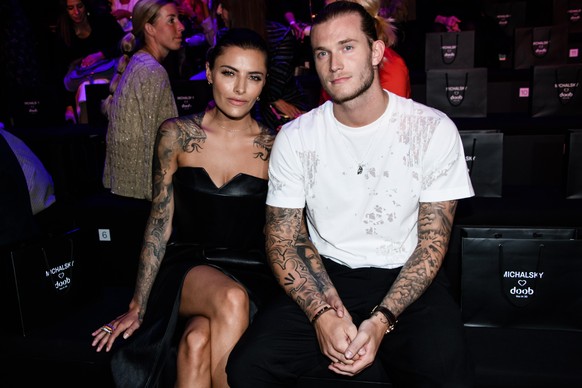 epa07693182 German actress and model Sophia Thomalla (L) and her boyfriend German soccer player Loris Sven Karius (R) attend the Atelier Michalsky show during the Mercedes-Benz Fashion Week in Berlin, ...