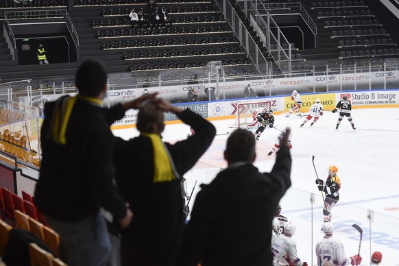 Fans in the stands of the stadium, 50 spectators were selected by lot for the game, during the fifth leg of the playoff best of seven match of the Swiss National League between HC Lugano and SC Rapper ...