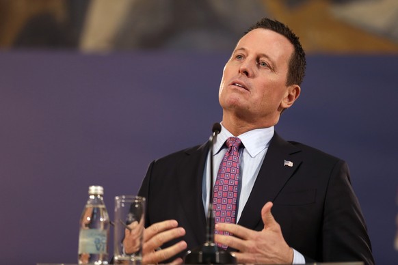 epa08157987 US ambassador to Germany Richard Grenell gestures during the press conference with Serbian President Aleksandar Vucic (not pictured) in Belgrade, Serbia, 24 January 2020. US President Dona ...