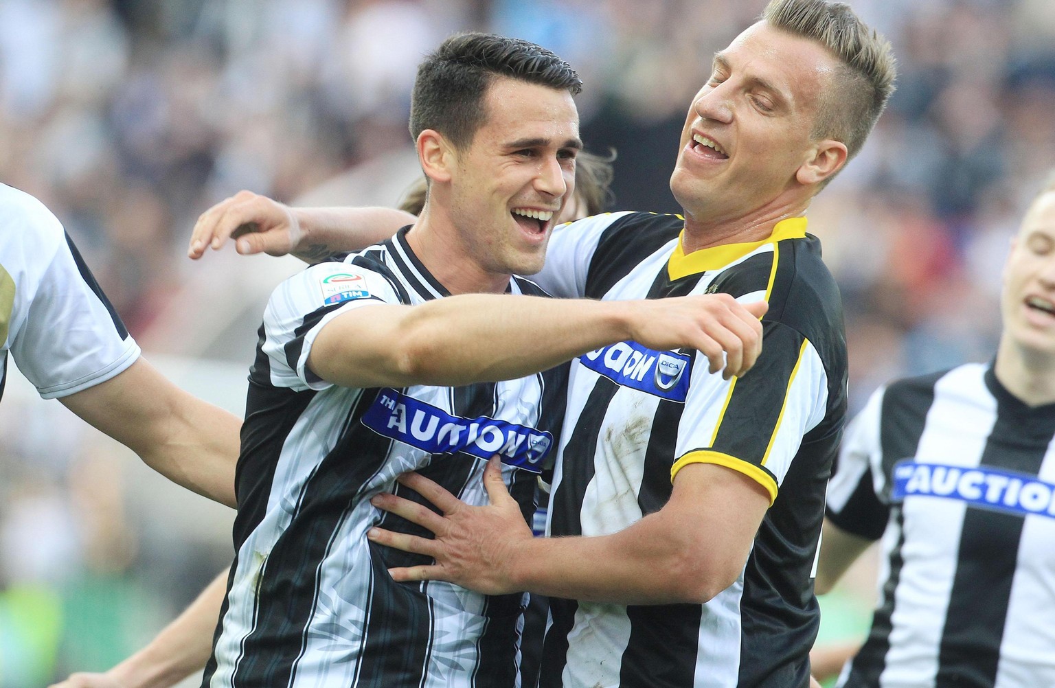 Udinese&#039; Kevin Lasagna, left, celebrates with his teammate Maxililiano Lopez after he scored during an Italian Serie A soccer match between Udinese and Lazio, at the Friuli stadium in Udine, Ital ...