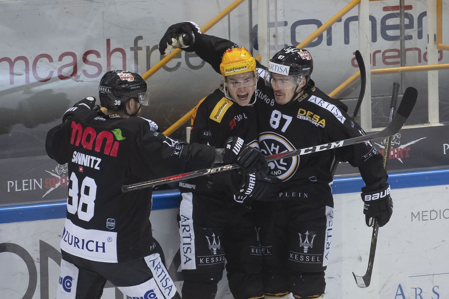 From left: Lugano&#039;s player Raffaele Sannitz, Lugano&#039;s player Gregory Hofmann and Lugano&#039;s player Dario Buergler, celebrate 1-0 goal, during the preliminary round game of National League ...
