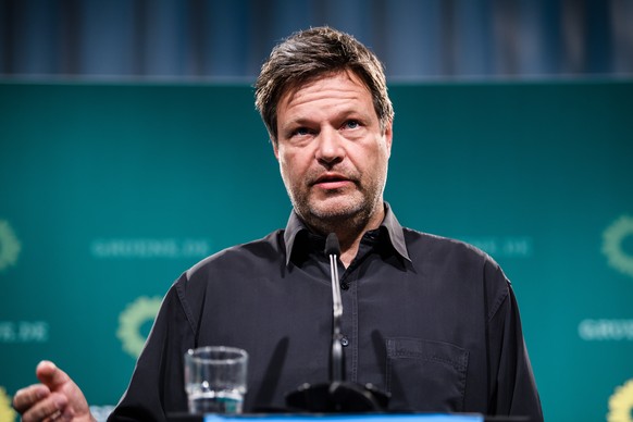 epa09130847 Green party (Die Gruenen) co-chairman Robert Habeck attends a press conference in Berlin, Germany, 12 April 2021. The Greens are about to present their candidate for chancellorship for the ...