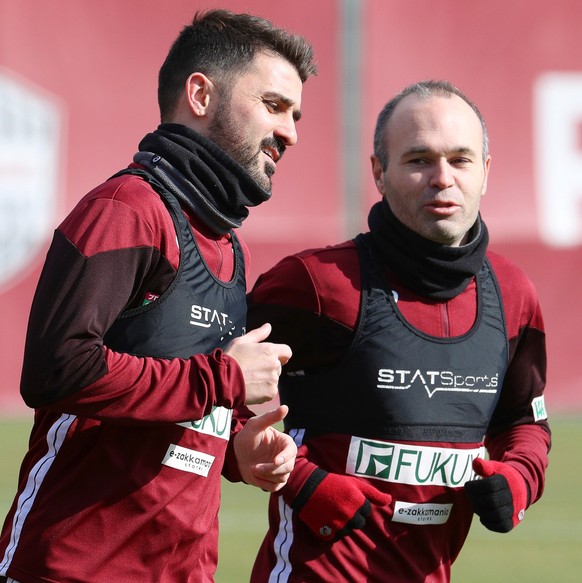 epa07292065 Vissel Kobe&#039;s Spanish soccer players David Villa (L) and Andres Iniesta (R) attend their team&#039;s training session in Kobe, western Japan, 17 January 2019. After leaving New York C ...