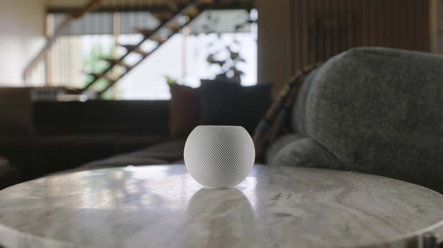 This image provided by Apple shows the new HomePod Mini that Apple unveiled Tuesday, Oct. 13, 2020. The new HomePod Mini will cost almost $100. It will integrate Apple&#039;s own music service, of cou ...