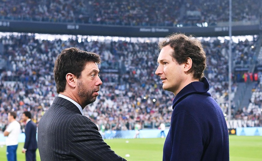 epa06686245 Juventus&#039; chairman Andrea Agnelli (L) and Fiat Chrysler Chairman John Elkann (R) attend the Italian Serie A soccer match between Juventus FC and SSC Napoli in Turin, Italy, 22 April 2 ...