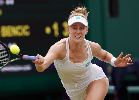 epa07698669 Alison Riske of USA returns to Belinda Bencic of Switzerland in their third round match during the Wimbledon Championships at the All England Lawn Tennis Club, in London, Britain, 06 July  ...