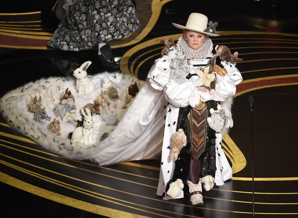 Melissa McCarthy walks on stage to present the award for best costume design at the Oscars on Sunday, Feb. 24, 2019, at the Dolby Theatre in Los Angeles. (Photo by Chris Pizzello/Invision/AP)