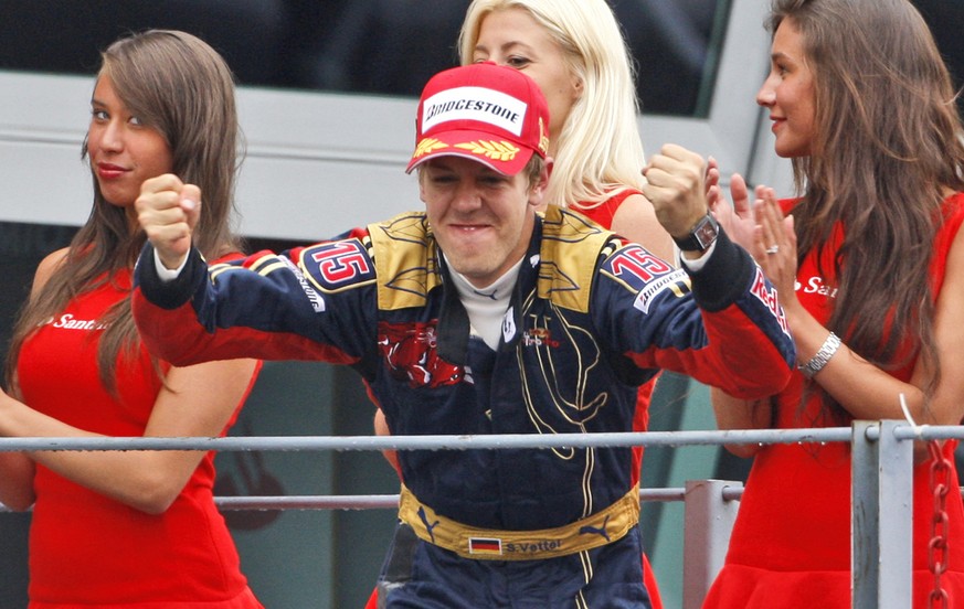 Toro Rosso driver Sebastian Vettel, of Germany, celebrates on the podium after winning the Formula One Grand Prix in Monza, Italy, Sunday, Sept.14, 2008. Sebastian Vettel has become the youngest drive ...
