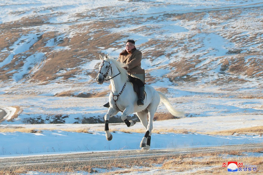 In this undated photo provided on Wednesday, Oct. 16, 2019, by the North Korean government, North Korean leader Kim Jong Un rides a white horse to climb Mount Paektu, North Korea. Independent journali ...
