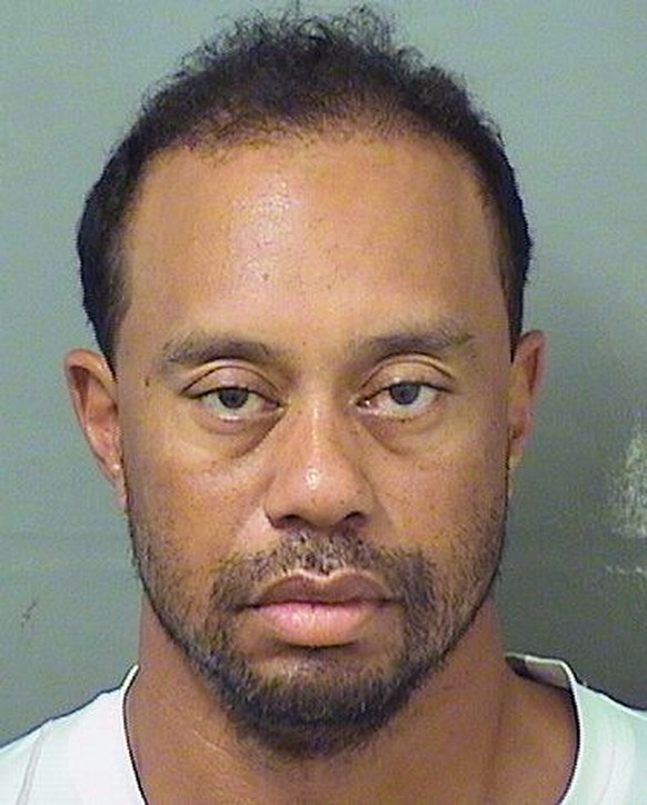 FILE- This file photo provided by the Palm Beach County Sheriff&#039;s Office on Monday, May 29, 2017, shows Tiger Woods. Woods&#039; progress should not be measured by the golf he has played the last ...