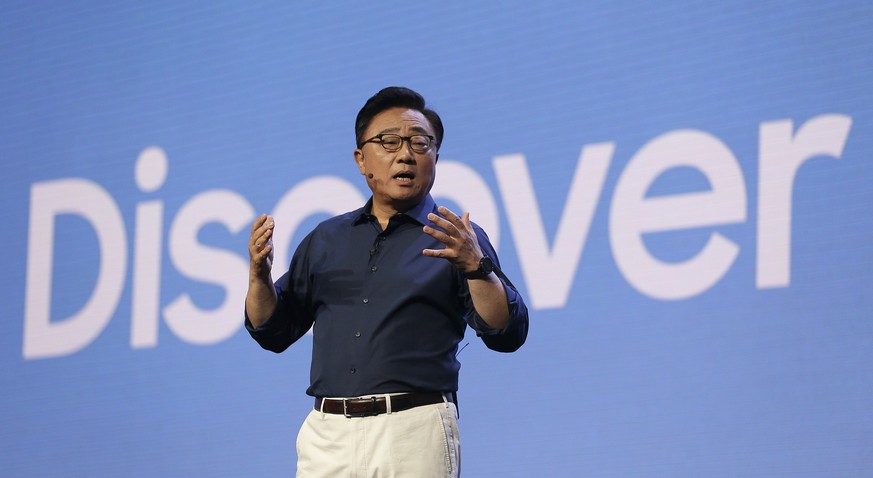 Samsung CEO DJ Koh speaks during the keynote address of the Samsung Developer Conference, Wednesday, Nov. 7, 2018, in San Francisco. (AP Photo/Eric Risberg)