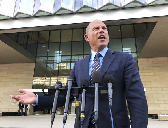 Michael Avenatti, attorney for porn actress Stormy Daniels, talks to reporters outside federal court in Los Angeles, Tuesday, Jan. 22, 2019. A federal judge appeared inclined to toss out a lawsuit aga ...