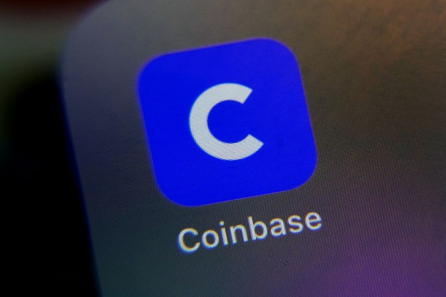 The mobile phone icon for the Coinbase app is shown in this photo, in New York, Tuesday, April 13, 2021. Coinbase is going public at a time when chatter about cryptocurrencies is everywhere, even at t ...