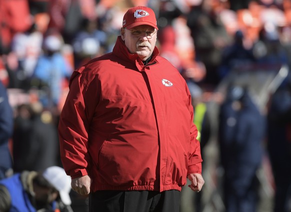epa08142195 Kansas City Chiefs head coach Andy Reid watches his team warm-up prior to the start of their AFC Championship game against the Tennessee Titans at Arrowhead Stadium in Kansas City, Missour ...
