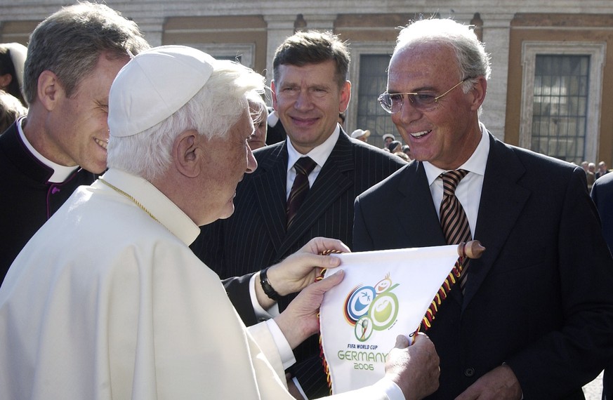 VATICAN CITY -OCTOBER 26: In this handout from the Vatican newspaper L&#039;Osservatore Romano, Franz Beckenbauer (2nd R), CEO of the German Organizing Committee of the 2006 World Football Cup meets P ...