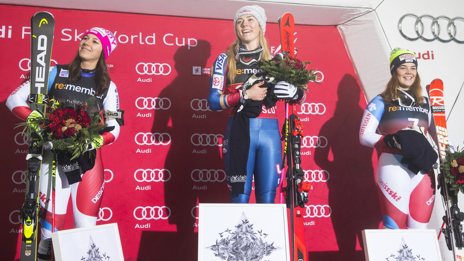epa06412932 First placed Mikaela Shiffrin (C) of USA, with second placed Wendy Holdener (L) of Switzerland and third placed Melanie Meillard (R) of Switzerland pose on a podium after the Women&#039;s  ...