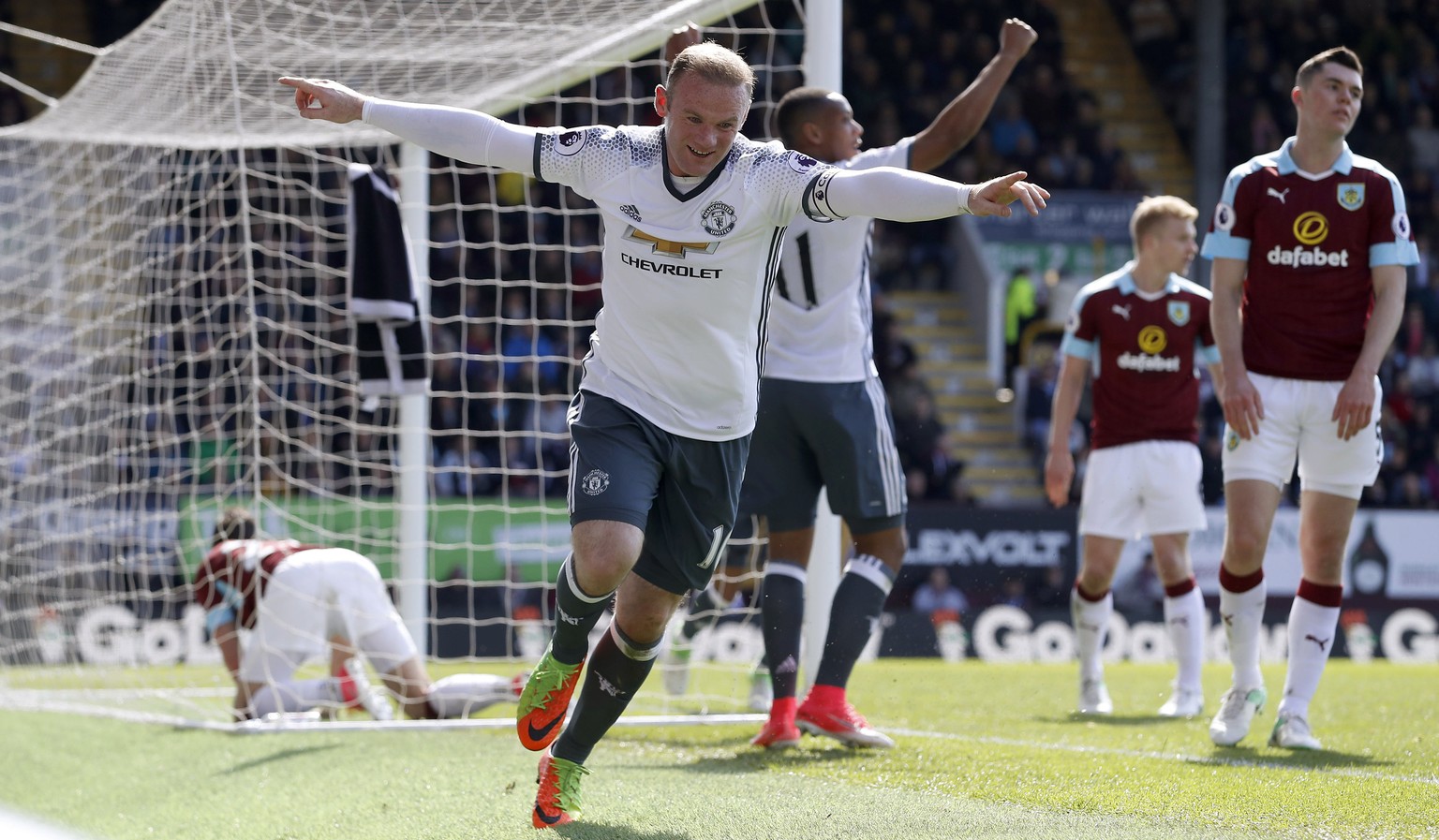 Manchester United&#039;s Wayne Rooney celebrates scoring his side&#039;s second goal of the game against Burnely during their English Premier League soccer match at Turf Moor in Burnley, England, Sund ...