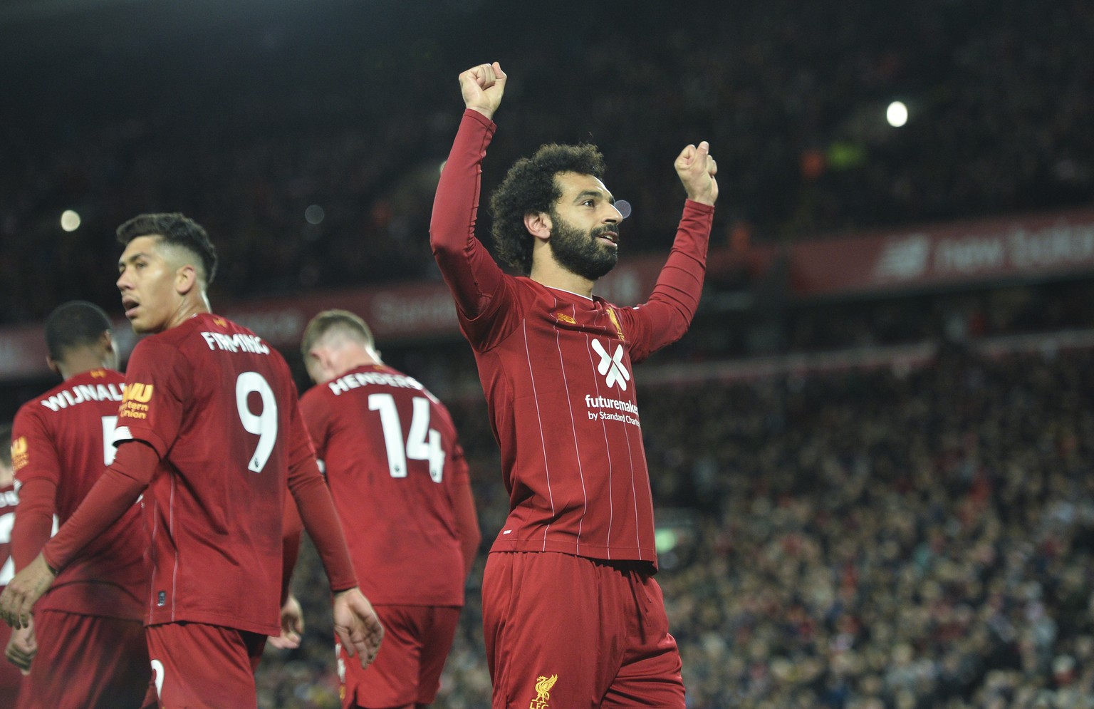 epa07954460 LiverpoolÄôs Mohamed Salah celebrates after scoring the 2-1 goal during the English Premier League game between Liverpool FC and Tottenham Hotspur in Liverpool, Britain, 27 October 2019.  ...