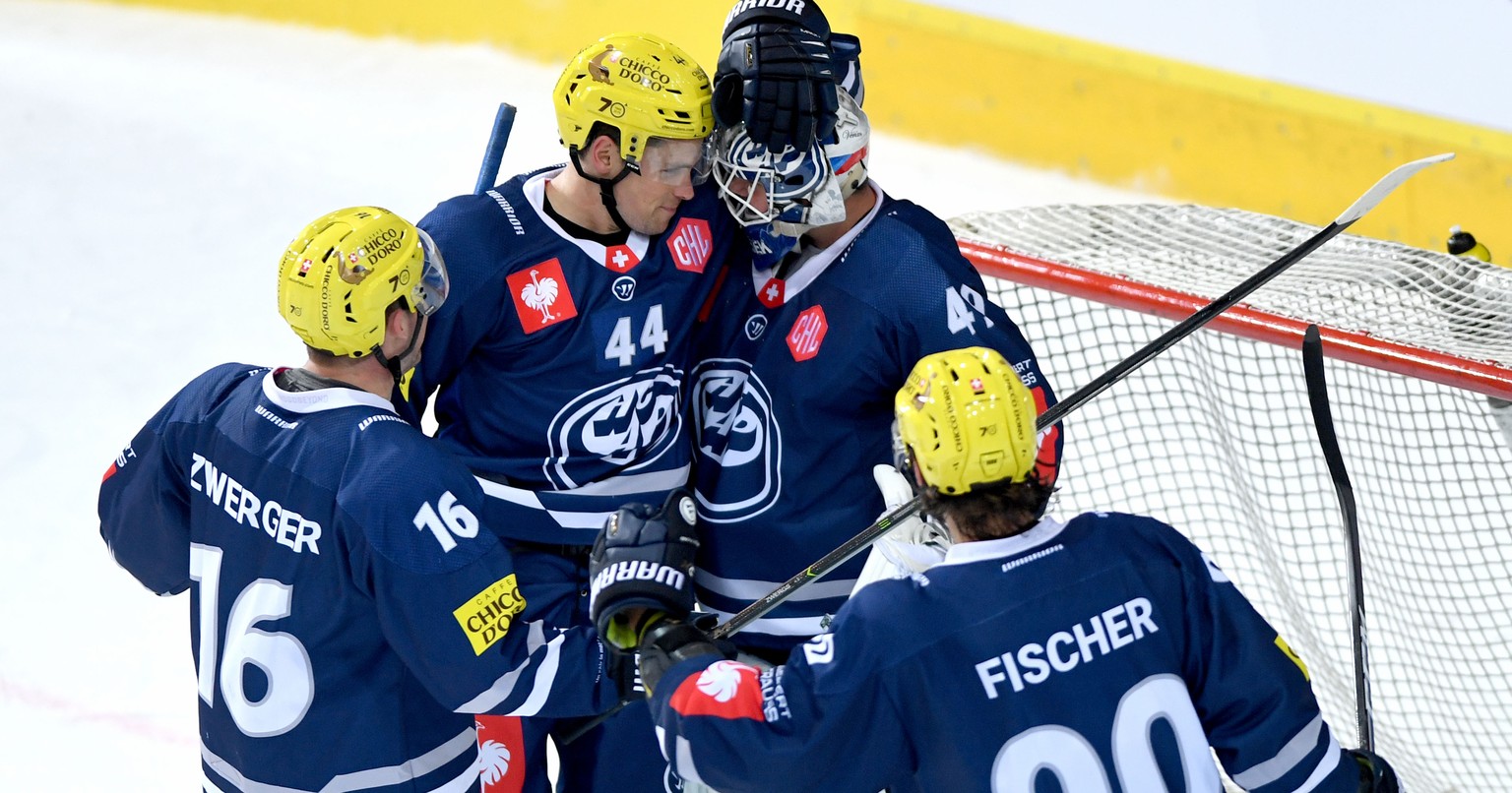 From left Ambri&#039;s player Dominic Zwerger, Ambri&#039;s player Nick Plastino, Ambri&#039;s goalkeeper Dominik Hrachovina and Ambri&#039;s player Jannik Fischer celebrate, during the round game of  ...