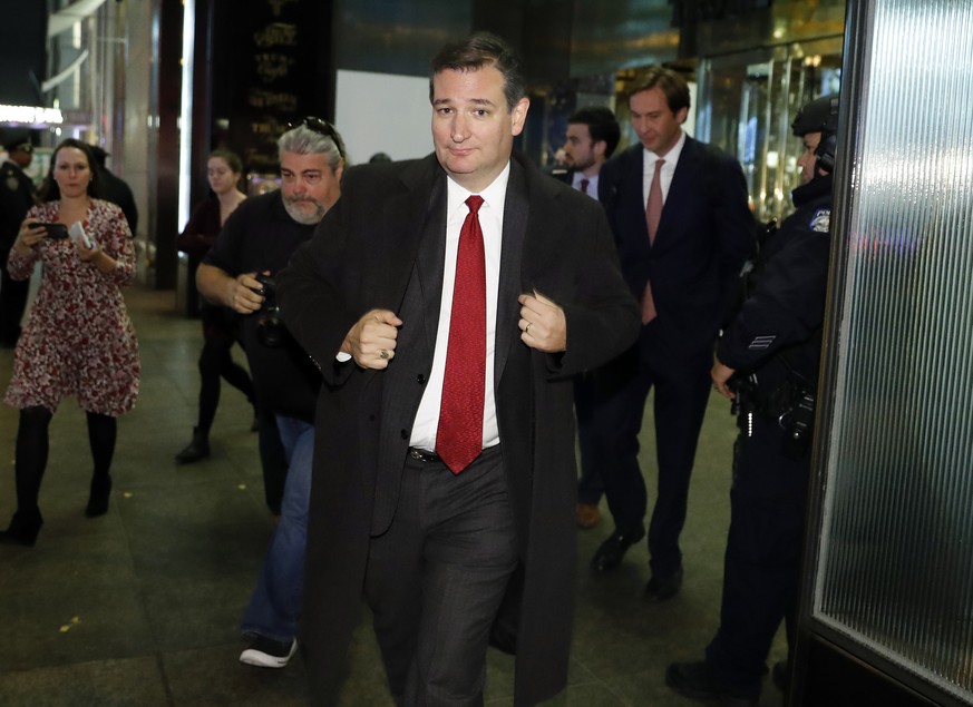 Sen. Ted Cruz, R-Texas, walks from Trump Tower, Tuesday, Nov. 15, 2016, in New York. (AP Photo/Carolyn Kaster)