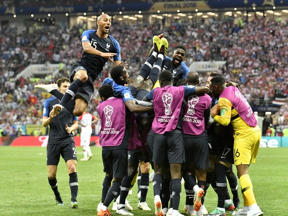 French players celebrate after Kylian Mbappe scored his side&#039;s fourth goal during the final match between France and Croatia at the 2018 soccer World Cup in the Luzhniki Stadium in Moscow, Russia ...