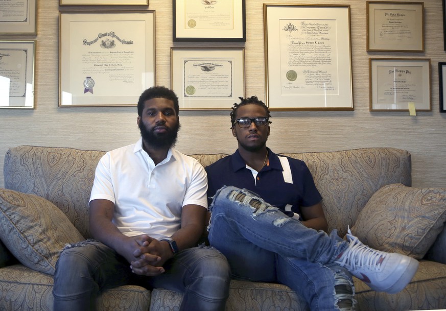 FILE – In this April 18, 2018, file photo, Rashon Nelson, left, and Donte Robinson, right, both 23, pose for a portrait following an interview with The Associated Press in Philadelphia. The two black  ...