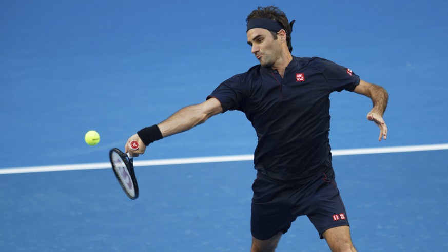 Switzerland&#039;s Roger Federer plays a return during his match against Britain&#039;s Cameron Norrie at the Hopman Cup in Perth, Australia, Sunday Dec. 30, 2018. (AP Photo/Trevor Collens)