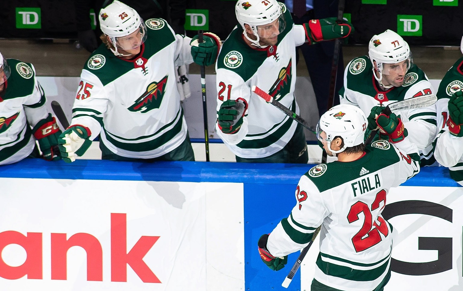 Minnesota Wild&#039;s Kevin Fiala (22) is congratulated for a goal against the Vancouver Canucks during the first period of an NHL hockey playoff game Sunday, Aug. 2, 2020, in Edmonton, Alberta. (Codi ...