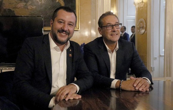 Italy Interior minister Matteo Salvini and Austrian Vice Chancellor Heinz-Christian Strache from left, pose before their meeting in Vienna, Austria, Friday, Sept. 14, 2018. (AP Photo/Ronald Zak)
