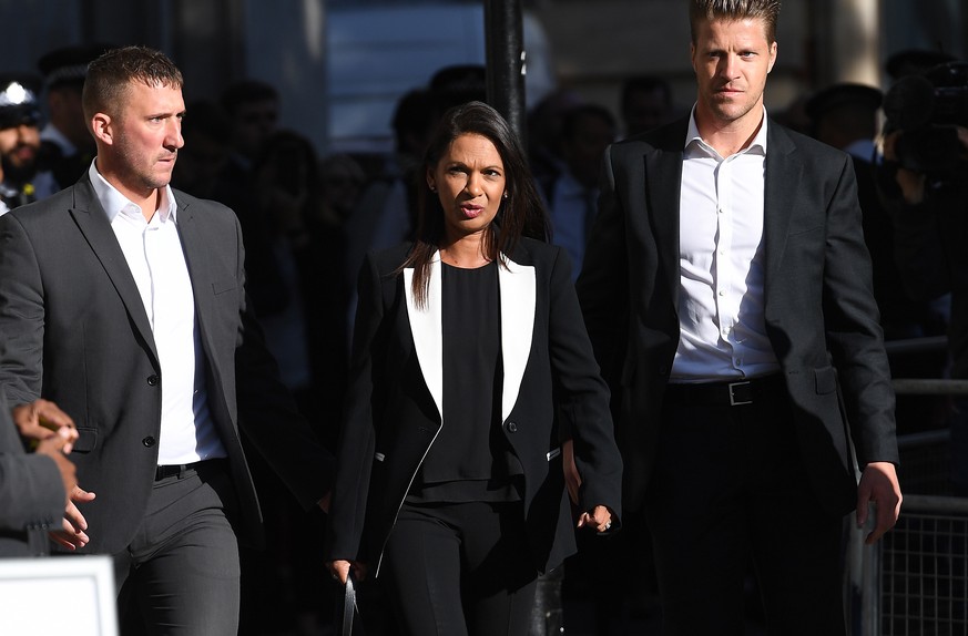 epa07850060 Anti-Brexit campaigner Gina Miller (C) arrives at the Supreme Court for a hearing on the prorogation of parliament, in London, Britain, 18 September 2019. The Supreme Court is due to rule  ...