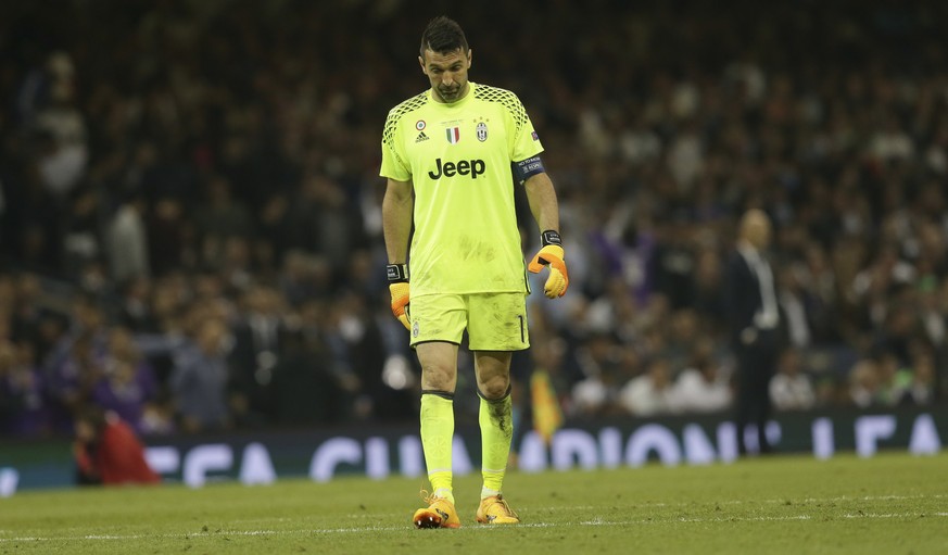 Juventus goalkeeper Gianluigi Buffon grimaces during the Champions League final soccer match between Juventus and Real Madrid at the Millennium Stadium in Cardiff, Wales, Saturday June 3, 2017. (AP Ph ...