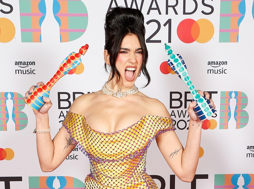 epa09192546 A handout photo made available by the Brit Awards shows Dua Lipa at the Brit Awards 2021 at the O2 Arena in Greenwich, Greater London, Britain, 11 May 2021. It is the 41st edition of the B ...